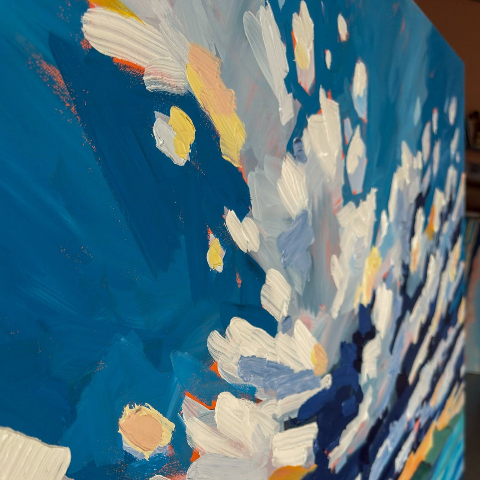 Close-up of a painting with brushstrokes in blue, white, and green.
